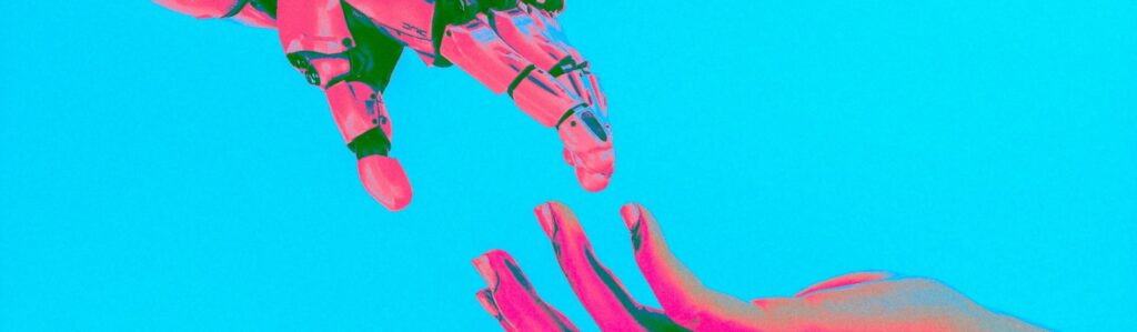 robot and human reaching hands